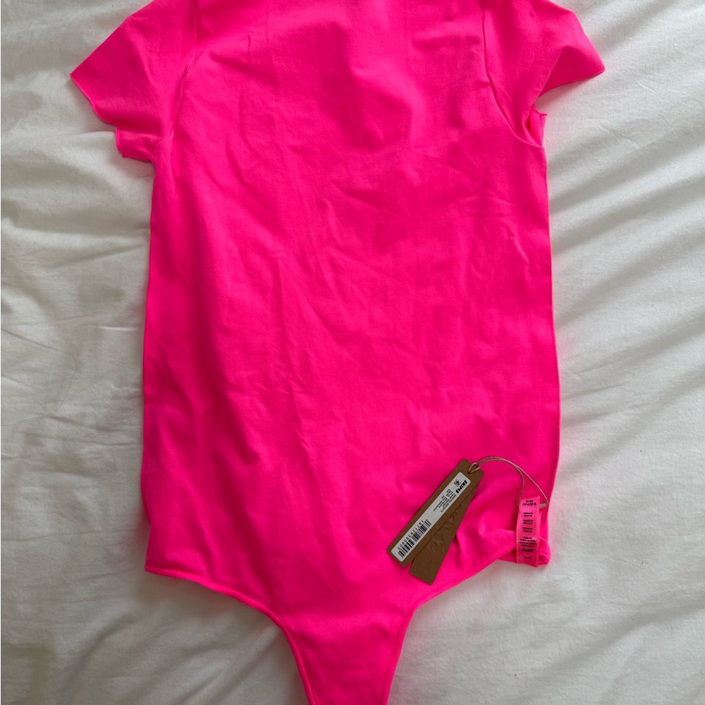 SKIMS Pink Bodysuit One Piece Stretchy Short Sleeve